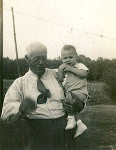 Pop holding grandson Mike
